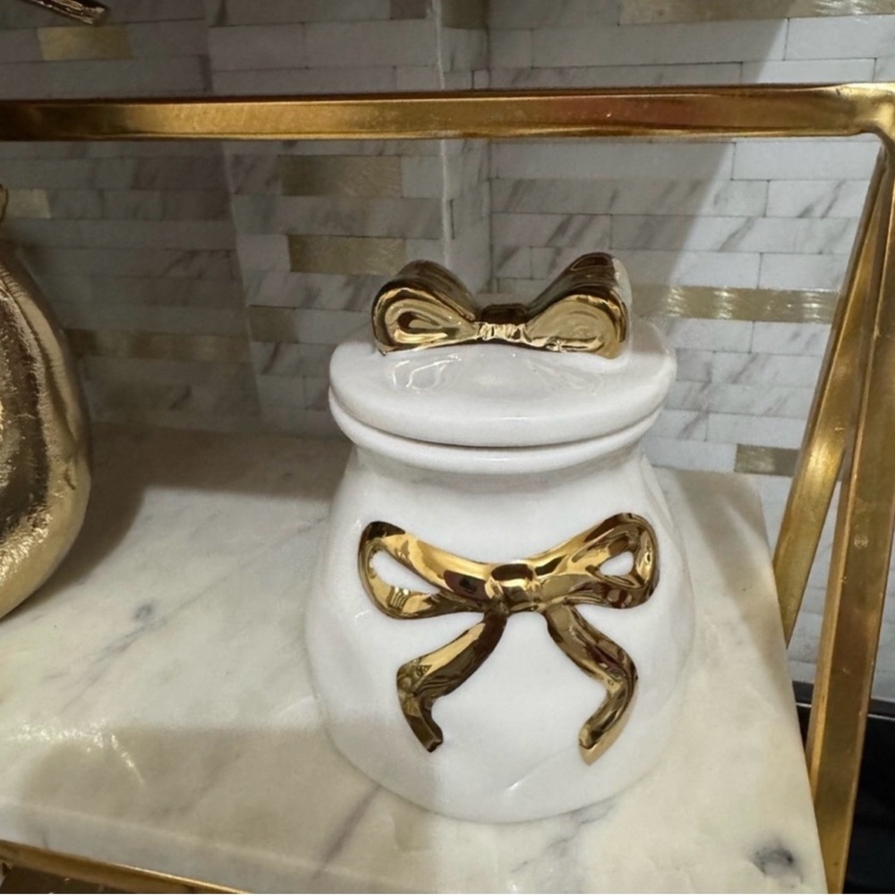 White Ceramic Jar with Gold Bow Accent